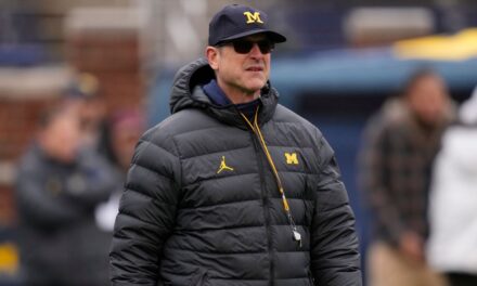 Jim Harbaugh de Michigan no será entrenador contra Penn State