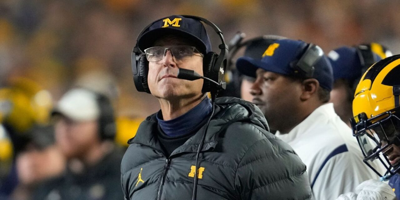 Michigan dice que la victoria número 1.000 debería ser para Jim Harbaugh, incluso si está suspendido