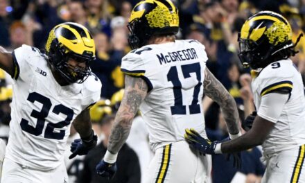 Michigan y Jim Harbaugh saborean el título del Big Ten después de una victoria por blanqueada sobre Iowa